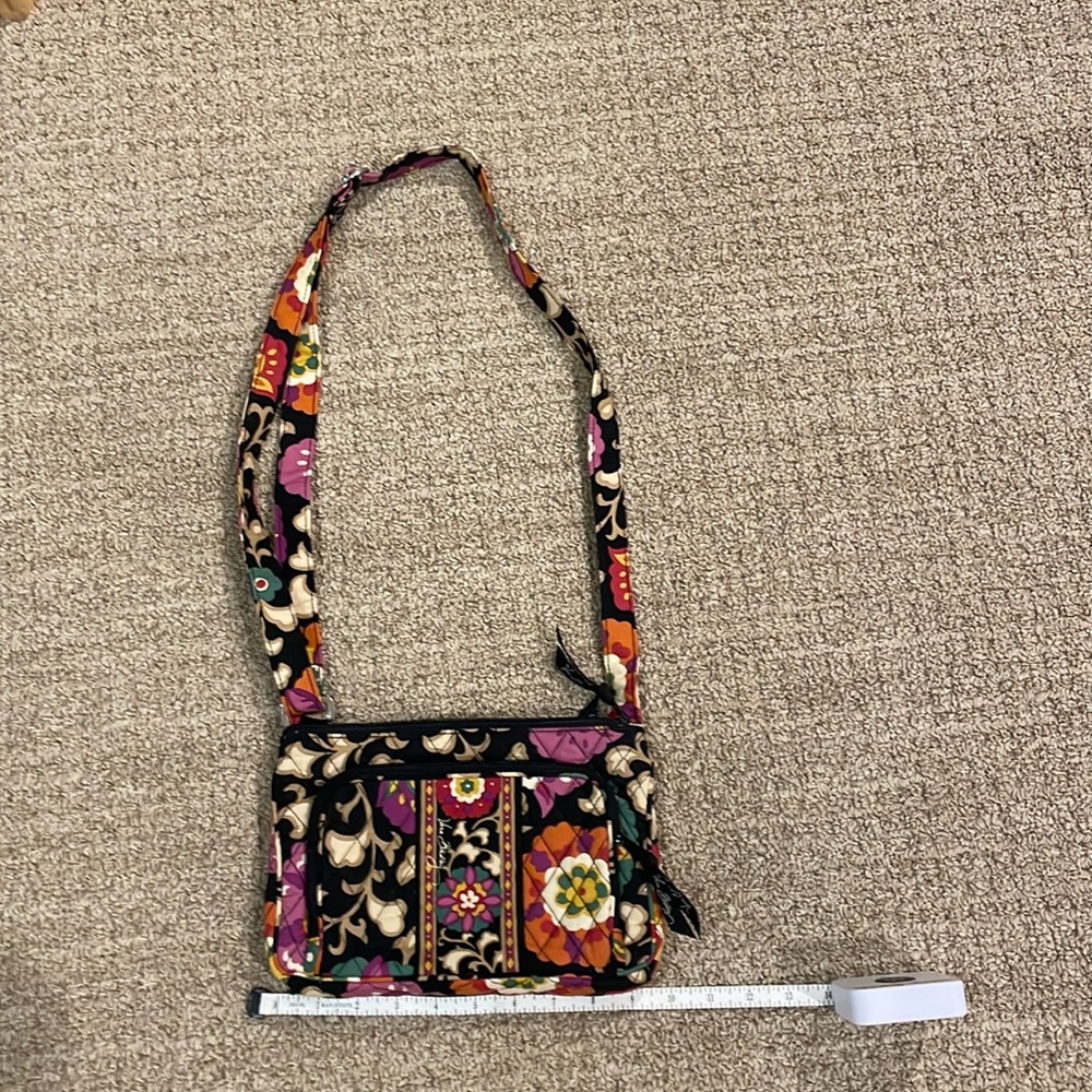 Never been worn Vera Bradley crossbody purse. Perfect for travel